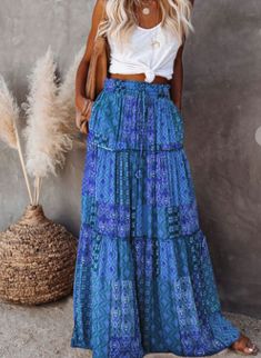 A captivating and bohemian-inspired addition to your wardrobe. This maxi skirt showcases a stunning paisley print that exudes elegance and free-spirited charm. Crafted with tiers of flowing fabric, the Mardona skirt creates a graceful and feminine silhouette that sways with your every step. Its lightweight and breathable material make it perfect for warm weather, while the maxi length adds a touch of sophistication. Size and Fit: Small: Stretch Waist 26" Length 38" Medium: Stretch Waist 27" Leng Bohemian Style Skirts, Long Skirt Casual, Stile Boho Chic, Look Boho Chic, High Waist Long Skirt, Chiffon Maxi Skirt, Flowy Maxi Skirts, Maxi Rok, Bohemian Skirt