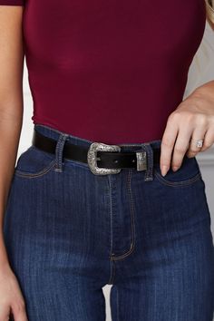 Elevate your style with our Camden Black Belt. Crafted with a sleek silver western buckle, this classic wardrobe staple exudes sophistication and adds a luxurious touch to any outfit. Perfect for those who appreciate timeless elegance. Trendy Belt Buckles For Fall, Black Belt Buckle With Belt For Fall, Classic Black Concho Belt Buckles, Classic Concho Belt Buckles, Western Silver Belt With Buckle Closure, Western Silver Belt With Buckle, Western Style Silver Belt Buckle, Western Black Belt Buckles With Silver Buckle, Western Black Belt Buckles With Silver Detail