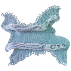 two wavy blue and white objects on a white background