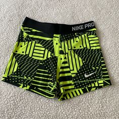 Nwot Nike Spandex Shorts Yellow Compression Sports Bottoms, Neon Yellow Stretch Workout Bottoms, Sporty Yellow Compression Bottoms, Yellow Athleisure Training Bottoms, Green Nike Athletic Stretch Shorts, Nike Green Stretch Athletic Shorts, Nike Yellow Sport Bottoms, Yellow Stretch Sports Bottoms, Yellow Stretch Sports Shorts