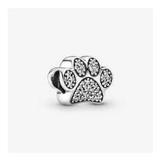 Celebrate your favorite four-legged friend with this Pandora paw print charm. Finely crafted in sterling silver, this adorable charm is embellished with sparkling cubic zirconia stones. A delightful gift for any cat or dog lover, it will add whimsical charm to your Pandora jewelery collection. Compatible With Pandora Moments Collection. Pandora Charms Friends, Pandora Wishlist, Pandora Charms Disney, Pet Paw Print, Pandora Heart, Paw Print Charm, Charms Pandora, Bracelet Pandora, Pandora Bracelet Charms