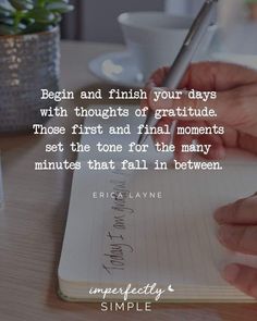 someone writing on a notepad with a pen in their hand and the words, begin and finish your days with thoughts of gratitude