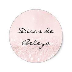 a round sticker with the words dios de belga written in black ink