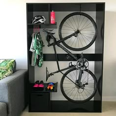 a bike mounted to the side of a wall in a living room