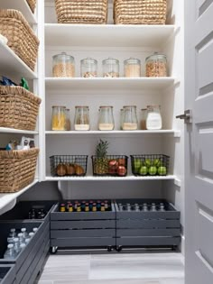 an organized pantry with lots of food in baskets and containers on the shelves next to each other