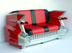 an old fashioned red and black car seat