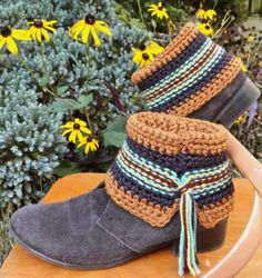 Add southwestern style to your short boots this season! The inner sock is tapered at the ankle for a comfortable fit, and the cuff is folded over the boot top.Youâll learn about short row shaping and slip stitch color work . . . new techniques for you and a new look for your boots! Boot Cuffs Crochet, Crochet Boot Cuff Pattern, Crochet Boot Cuff, Boot Cuff Pattern, Crochet Boot Cuffs, Crochet Leg Warmers, Boot Toppers, Crochet Boots, Crochet Booties