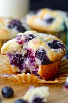 blueberry muffins with icing on a plate