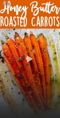 there are carrots that have been chopped up on a cutting board with the words honey butter roasted carrots