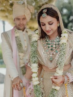 the bride and groom are getting ready to walk down the aisle