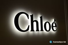 a close up of a sign on the side of a building that reads,'choe '