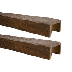 two pieces of wood sitting next to each other