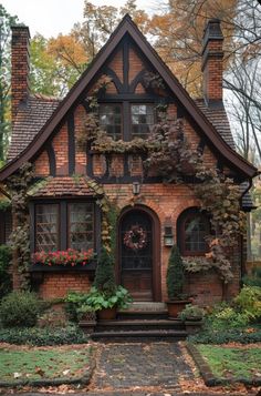 a brick house with ivy growing all over it