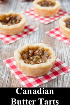 mini pies filled with apple filling on red and white checkered paper napkins