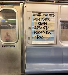 a sign on the door of a subway car that says when you miss new york, know the city misses you too