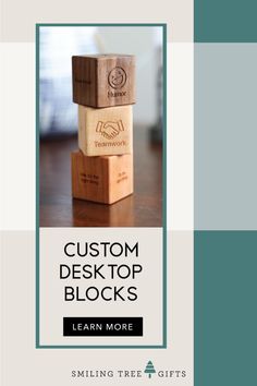 three wooden blocks stacked on top of each other with the text custom desktop blocks learn more