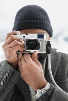 a man taking a photo with his camera