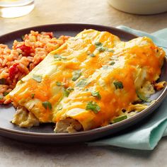 an omelet and some rice on a plate