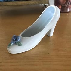 high heel shoe collectible Shoes Like Pottery, Ceramic Shoe Nike, Single Blue Flower, Ceramic Shoes Sculpture, Shoe Vase, Ceramic Horseshoe, Ap Ceramics, Ceramic Shoe, Ceramic Shoes