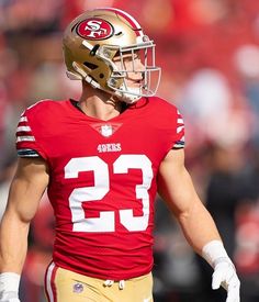 a close up of a football player wearing a helmet