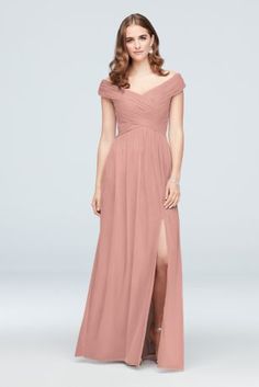 a woman in a long pink dress