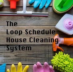 the loop schedule house cleaning system is laid out on top of a wooden table with rubber gloves