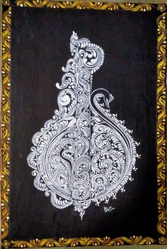 an intricately designed black and white painting with gold trimmings on a wooden frame