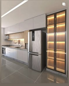 a modern kitchen with stainless steel appliances and cabinets