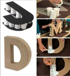 an image of some type of letters being made out of cardboards and paper plates