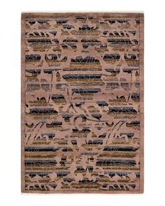 a brown rug with blue and black designs on it