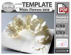 a white flower card with the text pop up template for cards and envelopes on it