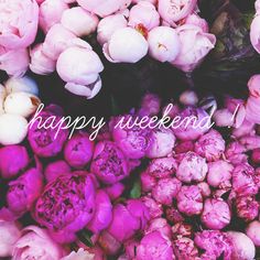 a bunch of pink flowers with the words happy weekend written on them in white lettering