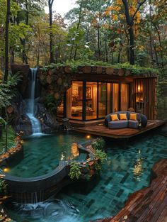 an outdoor living area with a pool and waterfall