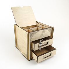 an open wooden box with two drawers and a chain hanging from the bottom, on a white background