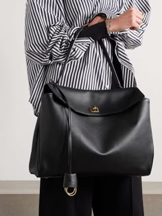 BALENCIAGA Rodeo leather tote Luxury Everyday Tote Bag, Trendy Large Handbags, Luxury Formal Calf Leather Bucket Bag, Soft Leather Handbags Black, Luxury Casual Bags, Luxury Elegant Tote Bag, Luxury Large Shoulder Bag, Luxury Minimalist Bucket Bag With Detachable Handle, Luxury Black Bags