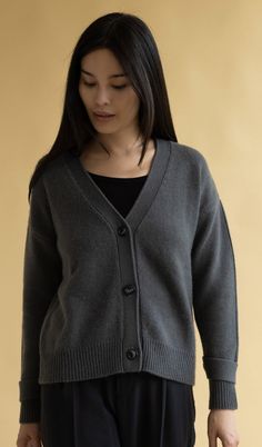 A new take on our cashmere cardigan sweater. 100% Grade A Mongolian cashmere in an oversized boyfriend fit. Features button front & adjustable button sleeve closure. DETAILS FIT: Model is 5'9" and is wearing a size S. FABRIC: 100% cashmere CARE: Hand wash cold with like colors. Lay flat to dry, low iron if needed. Sweater can be washed in a washing machine on delicate style. Lat Flat to dry or machine dry on gentle cycle. Hand washing cashmere can lead to a longer lifecycle. Everyday Cashmere Cardigan, Everyday Cashmere Cardigan With Buttons, Everyday Cashmere Cardigan With Button Closure, Casual Gray Cashmere Cardigan, Classic Gray Cashmere Cardigan, Everyday Button-up Cashmere Sweater, Elegant Cashmere Button-up Sweater, Gray Cotton Cardigan With Buttons, Winter Cashmere Button-up Cardigan