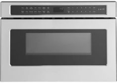 a stainless steel microwave oven with the door open and its electronic controls on it's side