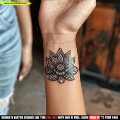 a woman's wrist tattoo with a lotus flower on the left side of her arm