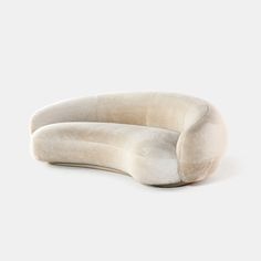 two curved pillows sitting on top of each other