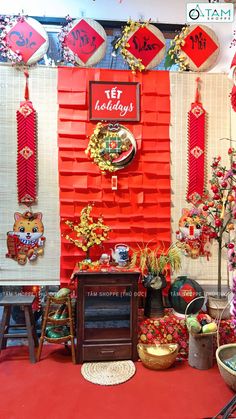 a red and white wall with decorations on it