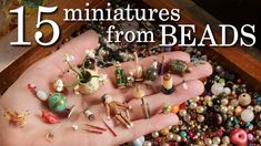 a hand is full of miniature beads with the words 15 miniaturess from beads on it