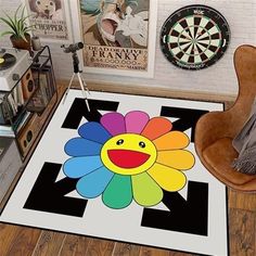 a colorful flower rug in the corner of a room with darts and darts on the wall