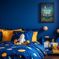 a child's bedroom with blue walls, yellow and orange bedding and stuffed animals