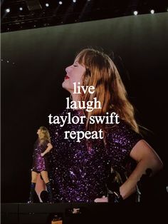 taylor swift on stage with words live laugh taylor swift repeats about taylor swift's performance