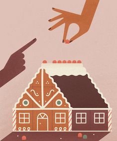 a hand reaching for a gingerbread house in front of another hand holding a pen