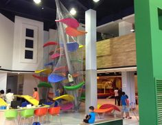 children are playing in an indoor play area