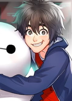 a person holding a snowman in front of their face and smiling at the camera