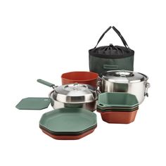 an assortment of pots and pans with carrying bag