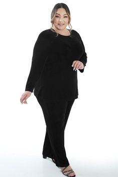 Long sleeve, round neckline top 30" from shoulder to hem – hits below hips Split hem Finely ribbed stretch knit - 94% Acetate/6% Spandex Machine wash, lay flat to dry Great for travel – just hang it up and any wrinkles fall out. Made in the USA Experience the beauty of Vikki Vi's Classic Black Long Sleeve Tunic. Crafted from luxurious acetate, this timeless classic promises an effortless look of refinement and comfort. Relax and wrap yourself in classic, understated elegance. Let Down, Plus Size Shopping, Draped Fabric, Long Sleeve Tunic, Pair Of Pants, Split Hem, Timeless Classic, Black Long Sleeve, Jersey Fabric