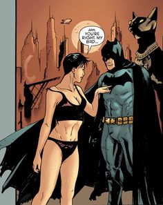 batman and batgirl standing next to each other